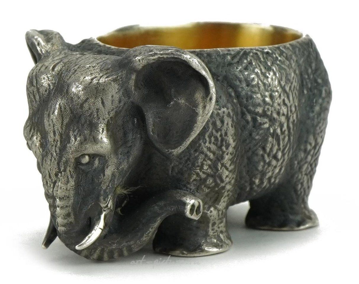 Russian silver , Cast silver gilt vodka cup in the form of an elephant with ruby eyes.