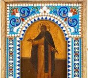 Маленькая икона с изображением монаха в серебряной позолоченной...