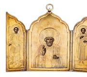 Триптих с иконой в золоченой серебряной раме, изображающей...