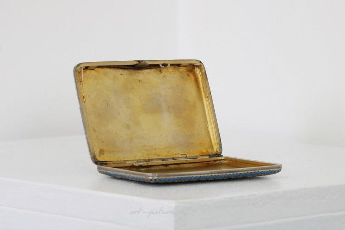 Russian silver , A Russian style silver-gilt and cloisonné cigarette case.