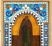 Маленькая икона с изображением монаха с серебряно-золотым...