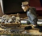 Авторская скульптура из камня «Горнорабочий», уральская школа объемной мозаики