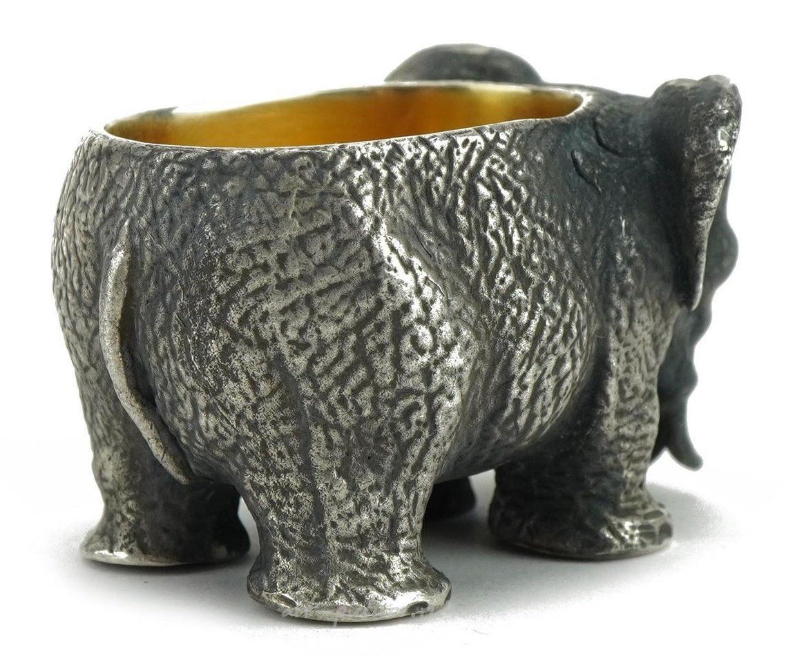 Russian silver , Cast silver gilt vodka cup in the form of an elephant with ruby eyes.