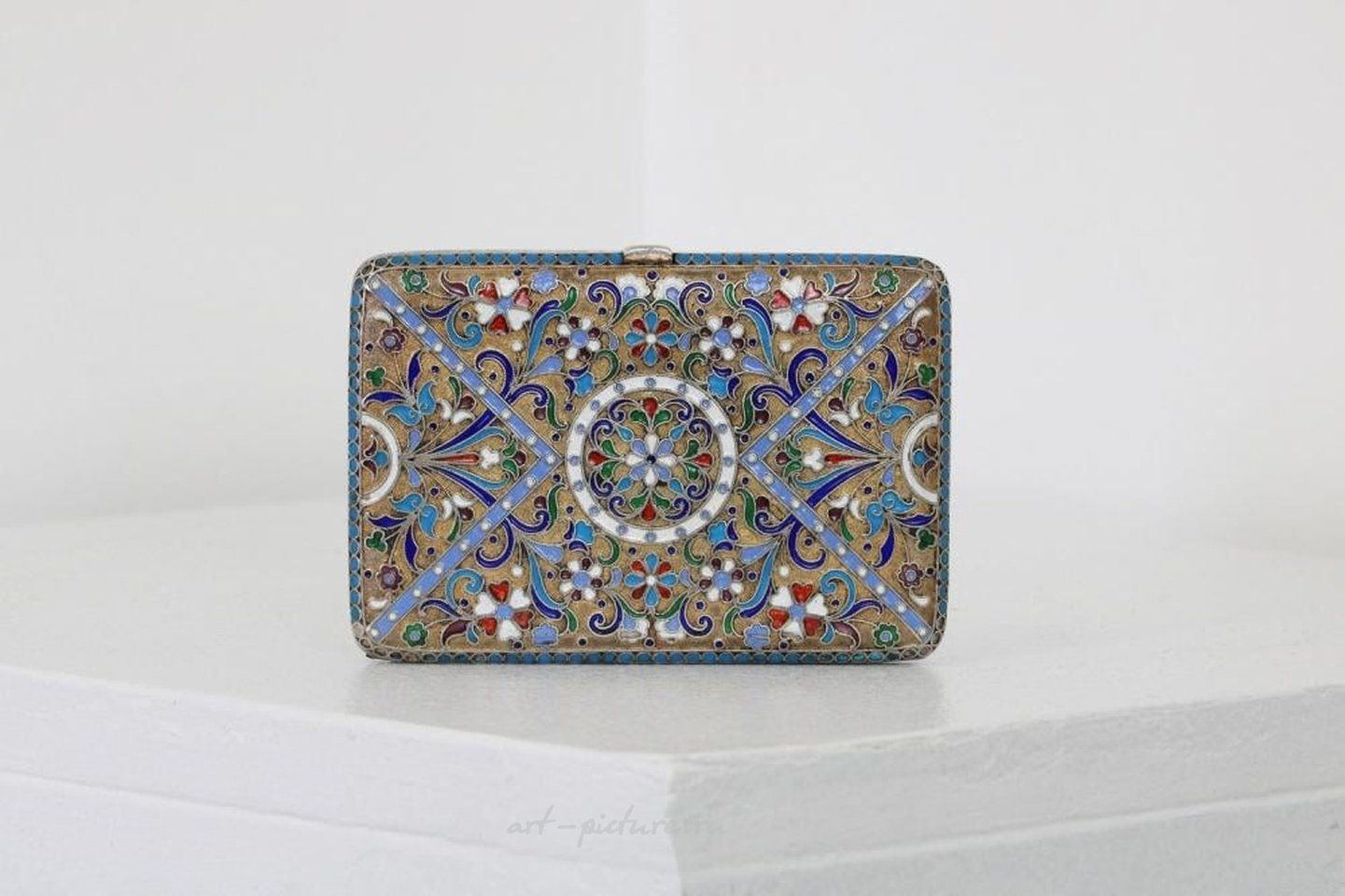 Russian silver , A Russian style silver-gilt and cloisonné cigarette case.