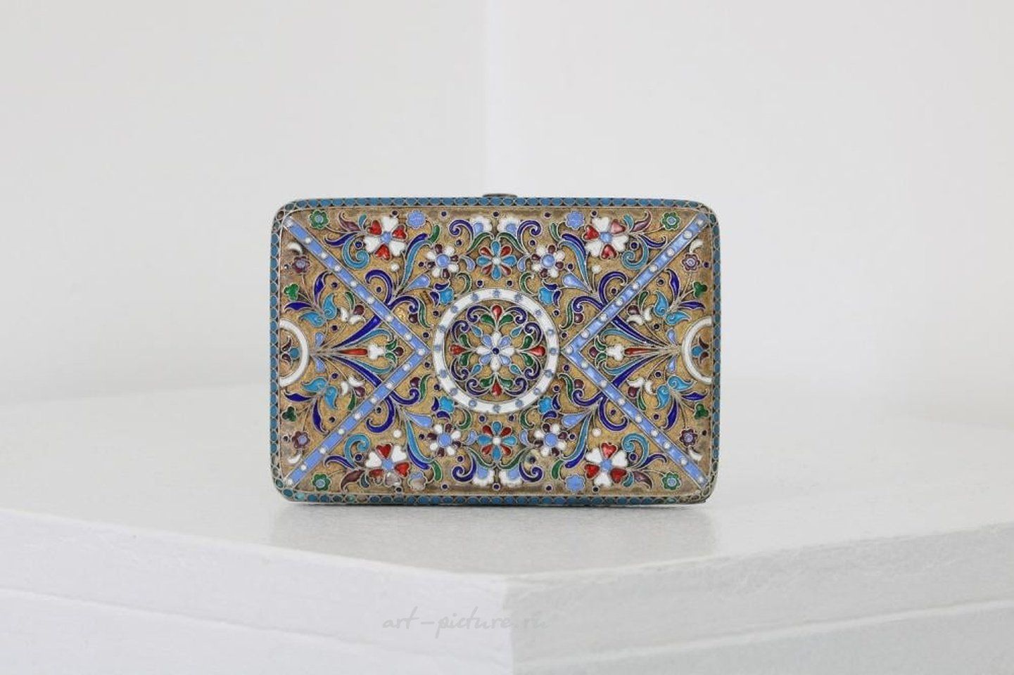 Russian silver , A Russian style silver-gilt and cloisonné cigarette case.