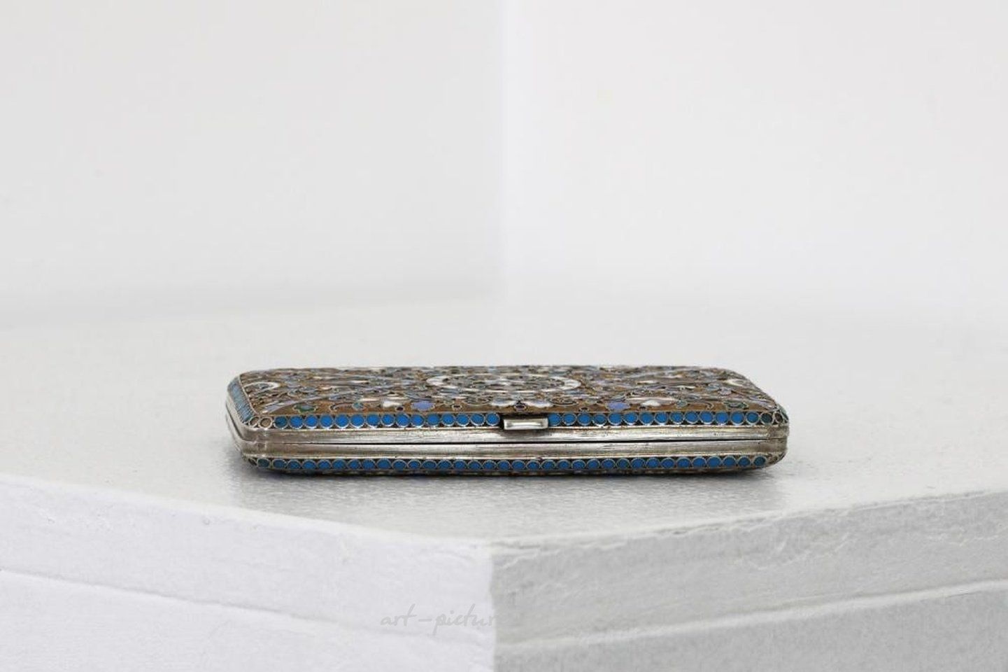 Russian silver , A Russian style silver-gilt and cloisonné cigarette case.