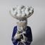 Женщина с корзиной яиц на голове. Дания, г. Копенгаген, Royal Copenhagen